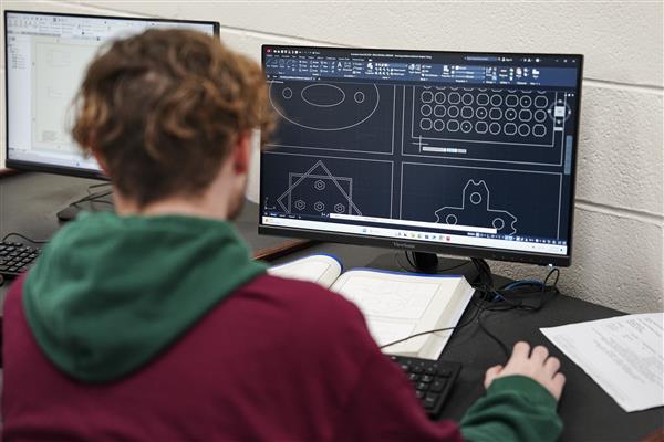 Architecture and Construction Engineering students working on computers 
